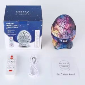Dinosaur Egg Galaxy Projector Lamp with stars and nebula projection, also showing the included remote controller and USB cable