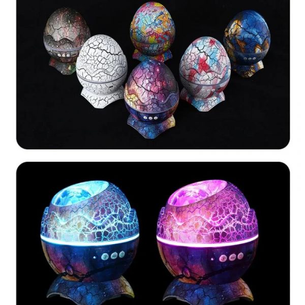 Dinosaur Egg Galaxy Projector Lamp with stars and nebula projection, also showing the included remote controller and USB cable